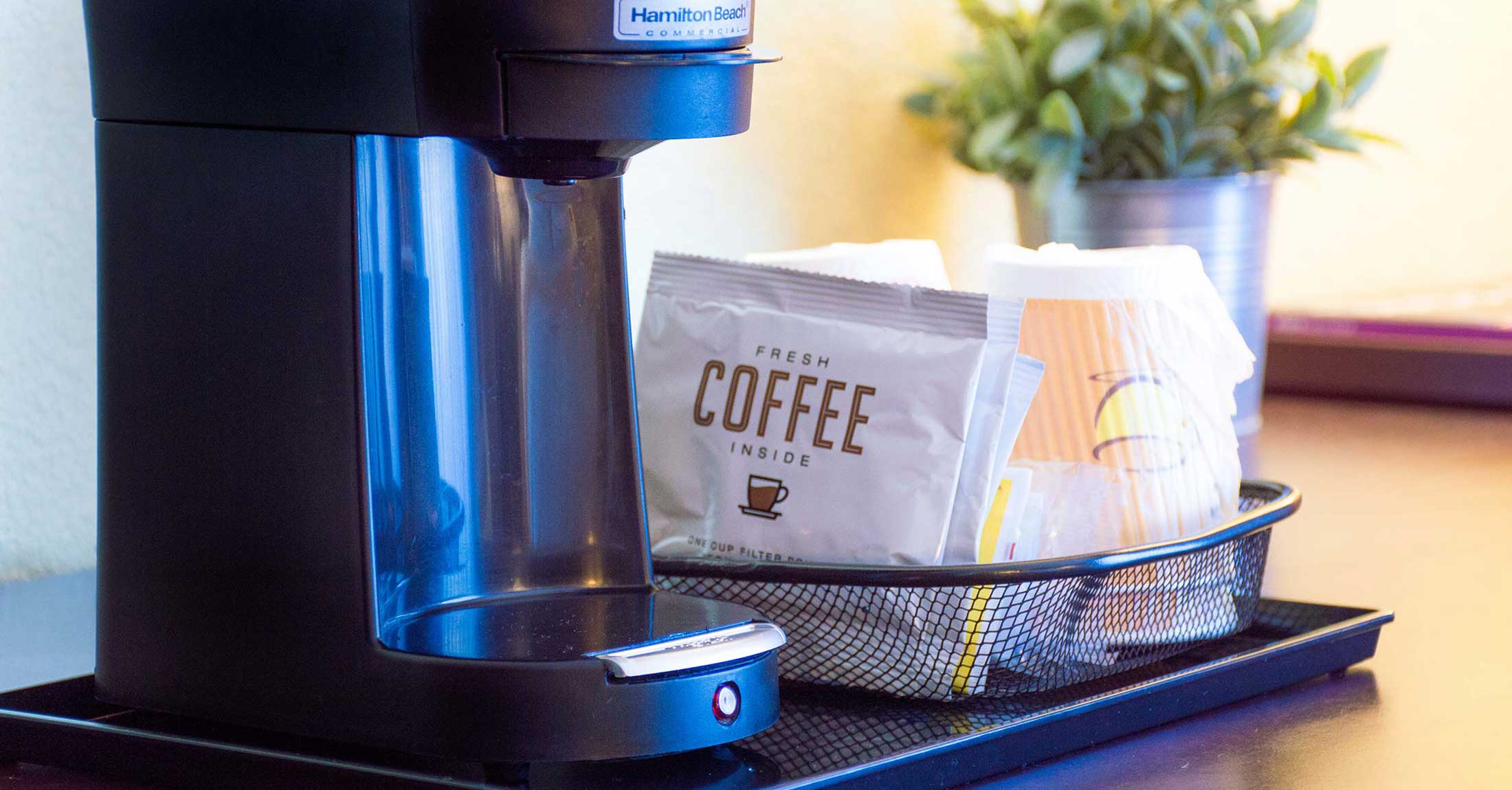 detail view of coffee maker amenities in room