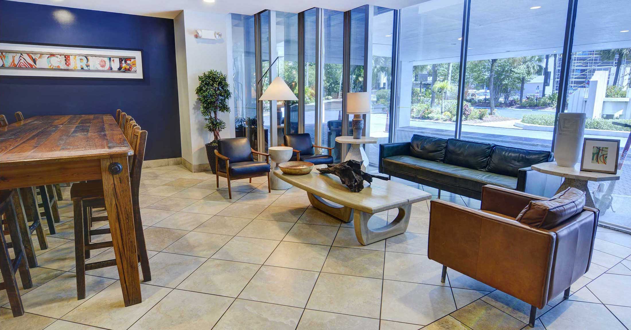 lobby seating area and large wooden community table