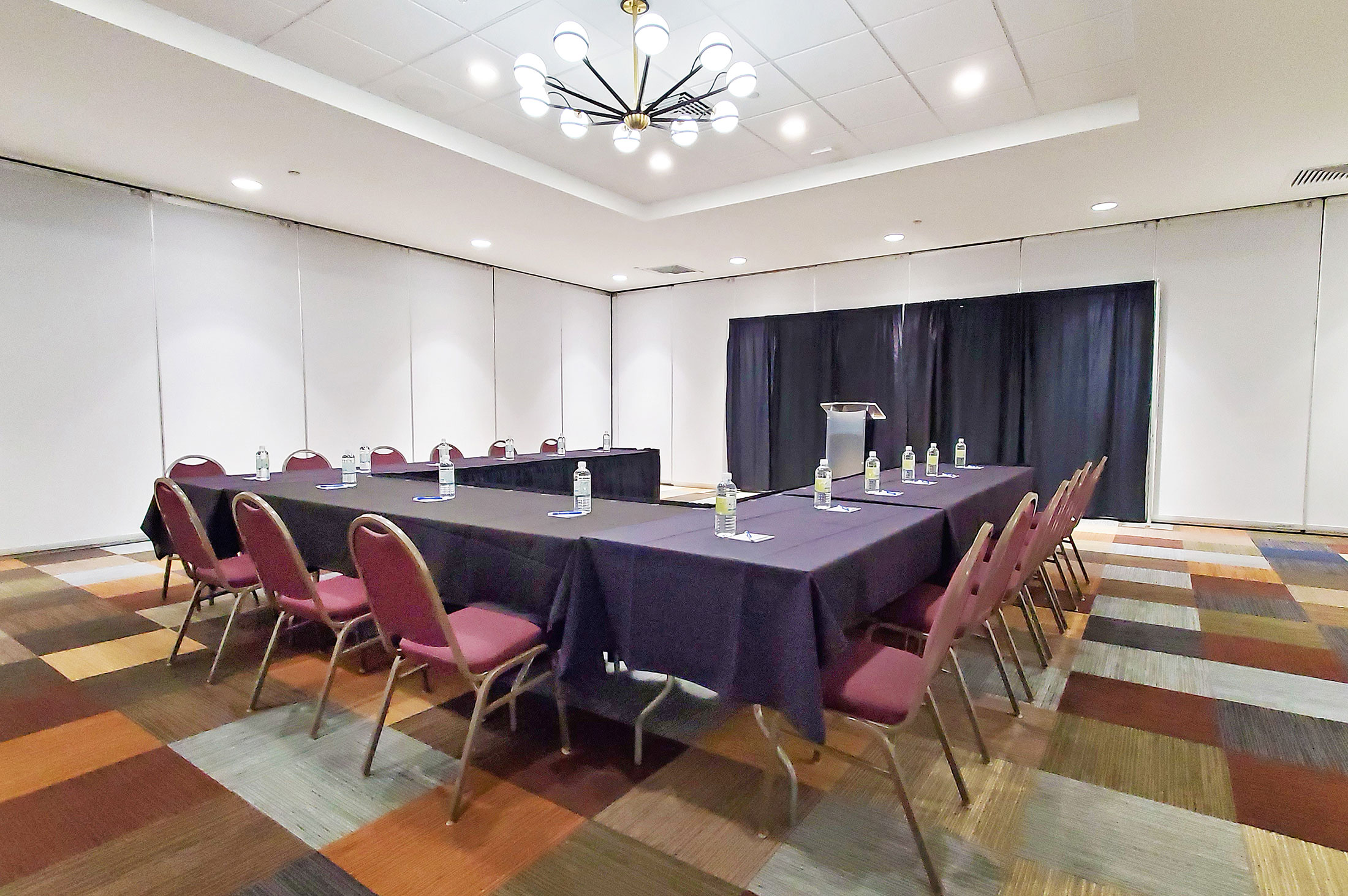 portion of ballroom with small u-shape meeting setup