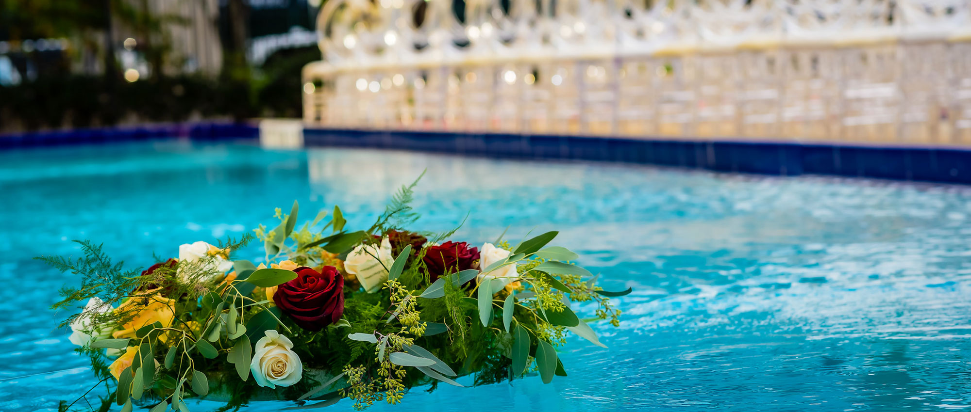 view of pool and drink