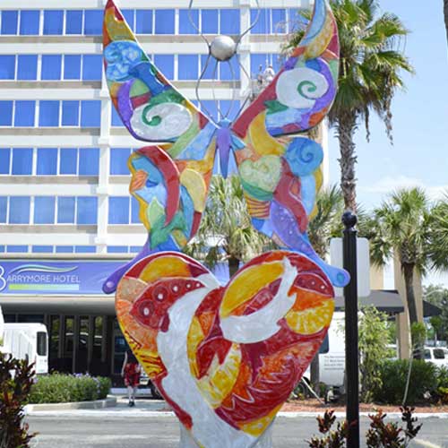 Rebirth Butterfly Sculpture in front of barrmore hotel